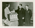 Tennessee Participation - Cooper, Prentice (Governor) - With Grover Whalen eating strawberries offered by woman