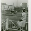 Tennessee Participation - Porter, Mary Nell (Maid of Cotton) - Sitting on railing and looking at Fairgrounds