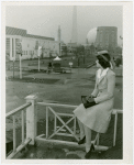 Tennessee Participation - Porter, Mary Nell (Maid of Cotton) - Sitting on railing and looking at Fairgrounds