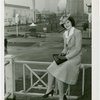 Tennessee Participation - Porter, Mary Nell (Maid of Cotton) - Sitting on railing with Fairgrounds in background