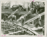 Theme Center - Trylon and Perisphere - Construction - Workers pouring concrete for foundation