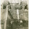 Theme Center - Trylon and Perisphere - Construction - Workers pouring concrete for foundation