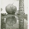 Theme Center - Trylon and Perisphere - Construction - Framework of Trylon and Perisphere, with reflection in water