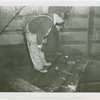 Theme Center - Trylon and Perisphere - Construction - Workers inspecting charred wiring