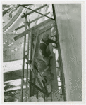 Theme Center - Trylon and Perisphere - Construction - Workers on scaffolding of Trylon