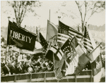 Theme Center - Trylon and Perisphere - Dedication - Men holdings flags