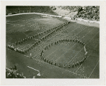 Theme Center - Trylon and Perisphere - Marching band forming shape of Trylon and Perisphere