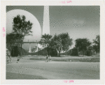 Theme Center - Trylon and Perisphere - View of Trylon and Perisphere through trees