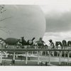 Theme Center - Trylon and Perisphere - Parade with floats on Helicline