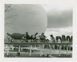 Theme Center - Trylon and Perisphere - Parade with floats on Helicline