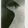 Theme Center - Trylon and Perisphere - Man and woman walking under Perisphere