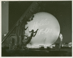 Theme Center - Trylon and Perisphere - ""Hello Folks!"" projected on Perisphere