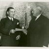 Ticket Sales - Official from American Express giving check to Harvey Gibson