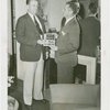 Town of Tomorrow - Official giving man franchise award in House No. 1