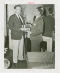 Town of Tomorrow - Official giving man franchise award in House No. 1