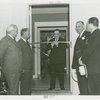 Town of Tomorrow - Fiorello LaGuardia cutting tape while Harvey Gibson, Grover Whalen and others look on