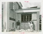 Town of Tomorrow - Construction - Two workers constructing brick wall