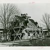 Town of Tomorrow - Construction - House with scaffolding and workers on roof
