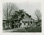 Town of Tomorrow - Construction - House with scaffolding and workers on roof