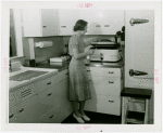 Town of Tomorrow - Houses - Interior - Woman in kitchen