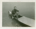Transportation to Fair - Man in canoe