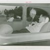 Transportation to Fair - Paralyzed man in car with parents