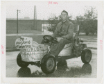 Transportation to Fair - Man in go-cart made of bathtubs