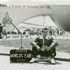 Transportation to Fair - Hitchhikers - Man and mechanical hand in suitcase