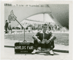 Transportation to Fair - Hitchhikers - Man and mechanical hand in suitcase