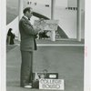 Transportation to Fair - Hitchhikers - Man with map and suitcase