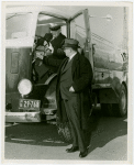 Trucks - Two men examining truck