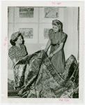 Turkey Participation - Women examine woven rugs