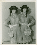 Twins - Female twins posing in hats