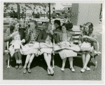 Typical American Family - Group of girls eating boxed lunches
