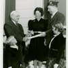 Typical American Family - Family receiving key and lease from Harvey Gibson