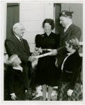 Typical American Family - Family receiving key and lease from Harvey Gibson