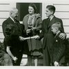 Typical American Family - Family receiving key and lease from Harvey Gibson