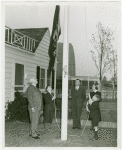 Typical American Family - Armes family raising Maine flag with Harvey Gibson