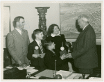 Typical American Family - Armes family children receiving signed baseballs from Harvey Gibson