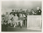 Typical American Family - Burdin family at dedication of houses listening to Harvey Gibson speak
