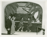Typical American Family - Burdin family looking at exhibit