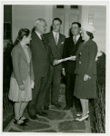 Typical American Family - Casto family receiving lease from Harvey Gibson