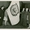 Typical American Family - Casto family raising West Virginia flag with Harvey Gibson