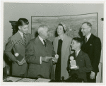 Typical American Family - Colemen family children with signed baseballs given by Harvey Gibson