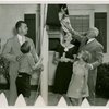 Typical American Family - Cramer family raising New York flag with Harvey Gibson