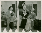 Typical American Family - Cramer family raising New York flag with Harvey Gibson