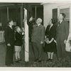 Typical American Family - Filkins family raising New York flag with Harvey Gibson