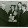 Typical American Family - Filkins family receiving signed baseballs from Harvey Gibson