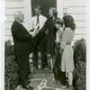 Typical American Family - Farman family receiving lease and key from Harvey Gibson