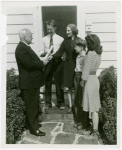 Typical American Family - Farman family receiving lease and key from Harvey Gibson